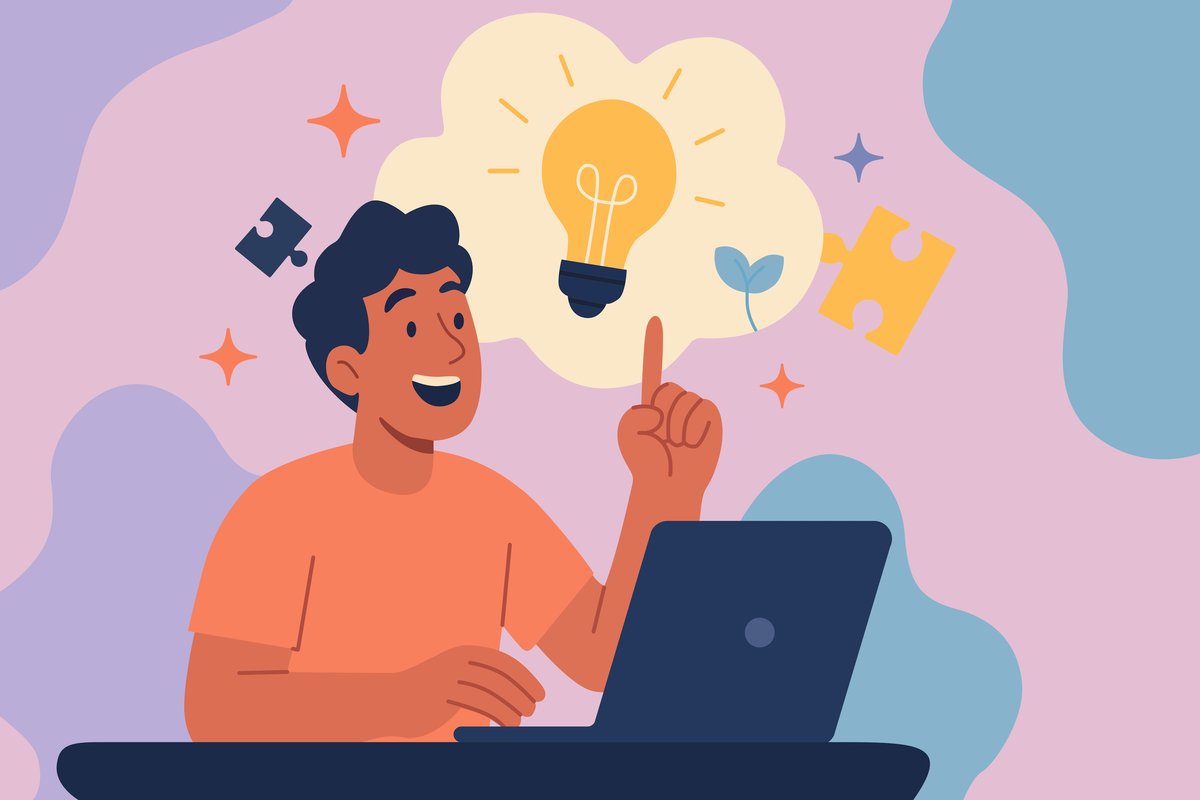 Man with laptop gets an idea, symbolized by a lightbulb